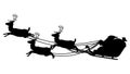 Silhouette of Santa Claus riding a sleigh pulled by three reindeers Royalty Free Stock Photo