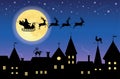 Silhouette of a santa on a sledge harnessed by magic reindeer flying over a town.