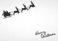 Silhouette of Santa on a sleigh flying with deer and throwing gifts on a white. Royalty Free Stock Photo