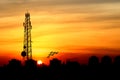 Silhouette of Satellite communication antenna with the sunset Royalty Free Stock Photo