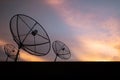 Silhouette, Satellite dish on roof with sky sunset, communication technology network image background