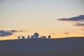 A silhouette of satellites when sun set in country side. Royalty Free Stock Photo
