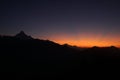 Silhouette scene and sunrise on Mt. Machapuchare, Machhapuchchhre or Machhapuchhre is a mountain in the Annapurna Himalayas