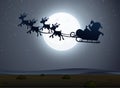 Silhouette scene wtih Santa on the sleigh at night time Royalty Free Stock Photo