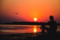 Silhouette by the sea