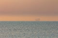 Silhouette of a sea tanker in the sea at dawn. Odesa. Ukraine Royalty Free Stock Photo