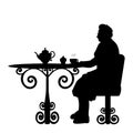 Silhouette senior woman grandma having tea at table