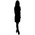 Silhouette of a woman with long legs in a short dress