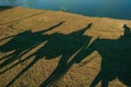 Silhouette shadows of people on horseback