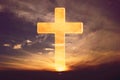 Silhouette of shining cross on sunset, sunrise background. Banner. Copy space. Easter, Ascension day concept. Church