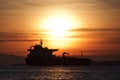 Silhouette of a ship at sunset in Vancouver, British Columbia, Canada