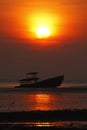 Silhouette of shipwreck and beautiful sunset in Phuket, Thailand Royalty Free Stock Photo