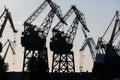 Silhouette shipyard have crane machine, Shipyard industry Royalty Free Stock Photo