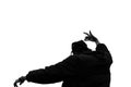 Silhouette shot of a man vibing and dancing isolated on a white background Royalty Free Stock Photo