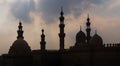 Silhouette shot of minarets and domes of Sultan Hasan and Al Rifai Mosques, Old Cairo, Egypt