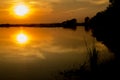 Silhouette shot, Sunset Over lake or pond or swamp of Bueng See Royalty Free Stock Photo