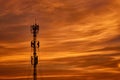 Silhouette signal antenna tower at sunrise sky Royalty Free Stock Photo