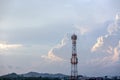 Silhouette signal antenna tower at sunrise sky Royalty Free Stock Photo