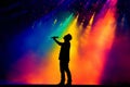 Silhouette of a singer on stage with a colorful light show in the background. Generative AI Royalty Free Stock Photo