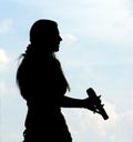 Silhouette Of Singing Girl