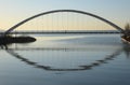 Silhouette of a single mounted cyclist on Humber Bay Arch Bridge Royalty Free Stock Photo