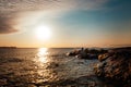 A silhouette of a single person sitting in the rocks Royalty Free Stock Photo