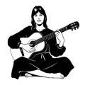 Silhouette of a sitting hippie girl playing on acoustic guitar.