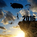 Silhouette skydiver parachutist landing in to the New Year 2016 Royalty Free Stock Photo