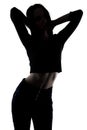 Silhouette slim woman with hands up