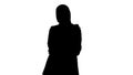 Silhouette Smiling Arab businesswoman wearing hijab posing for t