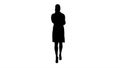 Silhouette Smiling female doctor on the phone talking while walk Royalty Free Stock Photo