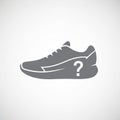 Silhouette of a sneaker with a question mark, set against a plain white background. Royalty Free Stock Photo