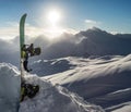 Silhouette of snowboard standing upright in snow