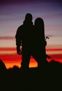 Silhouette of snowboarder against sunset Royalty Free Stock Photo