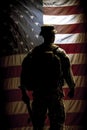 Silhouette of a soldier in uniform, with the American flag in the background, portraying strength and dedication to duty. Greeting