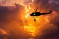 Silhouette soldiers in action rappelling climb down from helicopter with military mission counter terrorism assault training Royalty Free Stock Photo