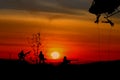 Silhouette Soldiers rappel down to attack from helicopter with sunset and copy space add text Concept stop hostilities To peace Royalty Free Stock Photo