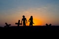 Silhouette some zombies on the cemetery walking around at sunset Royalty Free Stock Photo