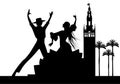 Silhouette of Spanish flamenco dancers couple, palm trees and monuments in Seville. Royalty Free Stock Photo