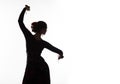 Silhouette of spanish girl flamenco dancer on a light background. free space for your text Royalty Free Stock Photo