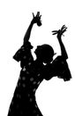 Silhouette of Spanish woman Flamenco dancer dancing Sevillanas