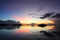 Silhouette of speed boat with beautiful sunrise background Royalty Free Stock Photo