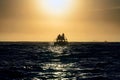 Silhouette of Speed boat in the ocean at sunrise.  South Africa Royalty Free Stock Photo