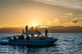 Silhouette of Speed boat in the ocean at sunset Royalty Free Stock Photo