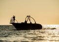 Silhouette of speed boat in the sea Royalty Free Stock Photo