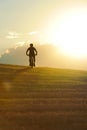 Silhouette sport man cycling downhill riding cross country mount Royalty Free Stock Photo