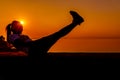 Silhouette sporty woman with sunset. Healthy and exercise activity.