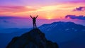 Silhouette stands triumphantly on the mountain top. Royalty Free Stock Photo