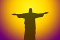 Silhouette of Statue of Christ the Redeemer in Rio de Janeiro City of Brazil on Golden Radial Backdrop