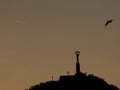 Silhouette of statue of liberty on the Gellert hill at sunset in Budapest,Hungary